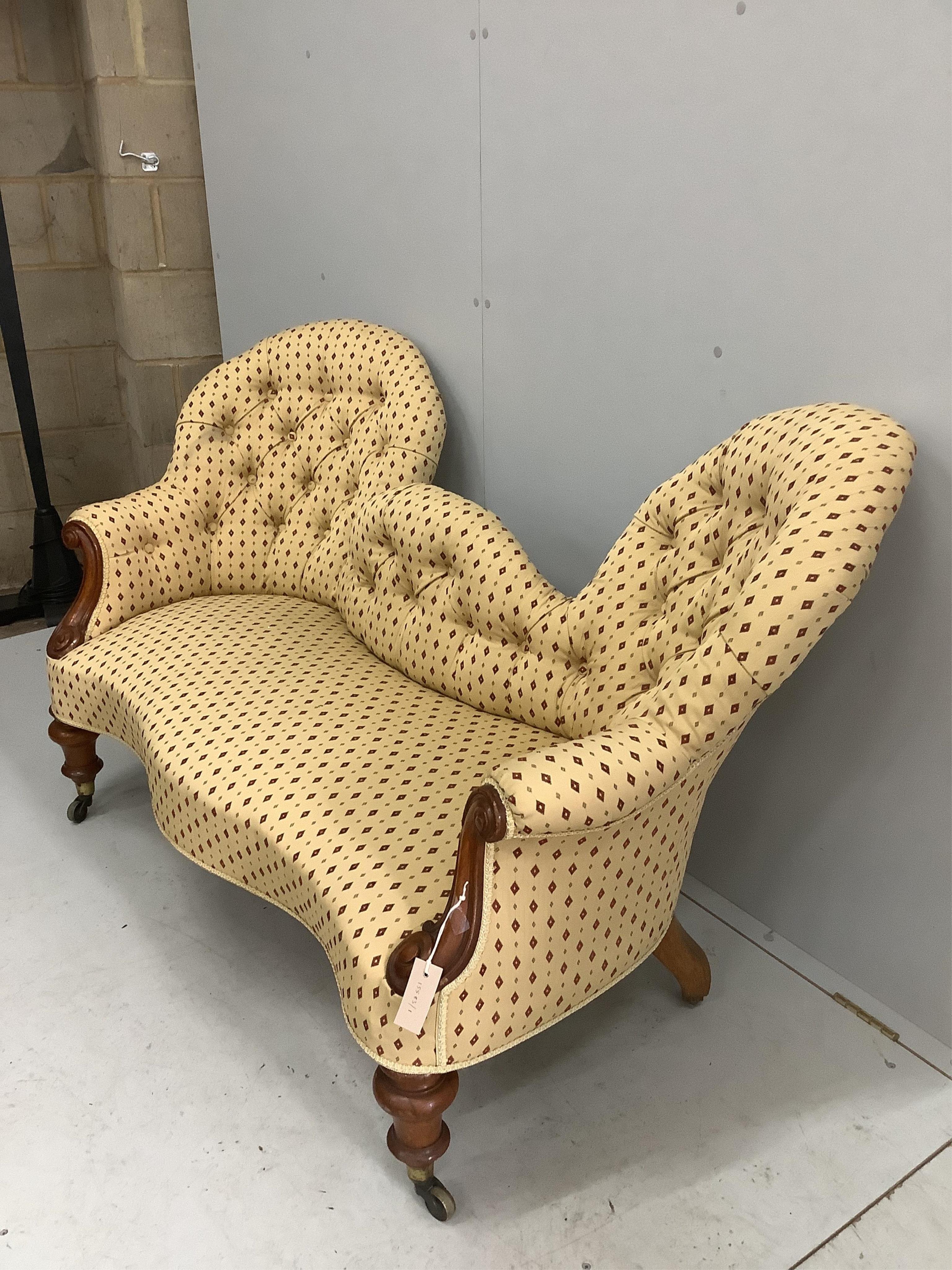 A Victorian upholstered double spoon back settee, width 154cm, depth 64cm, height 88cm. Condition - good